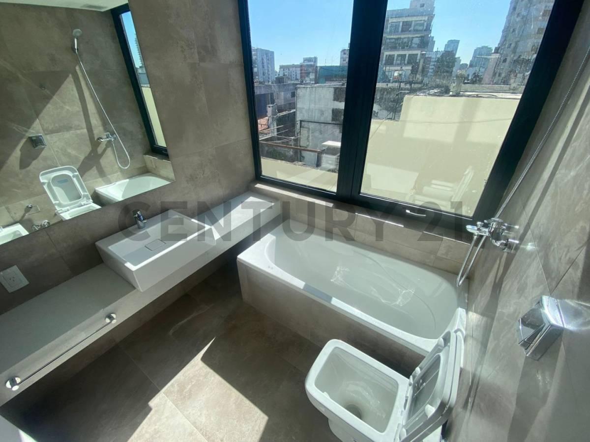 Foto de VENTA DEPTO 4 AMBIENTES CON COCHERA A ESTRENAR TORRE OM BOTANICO, imagen 3