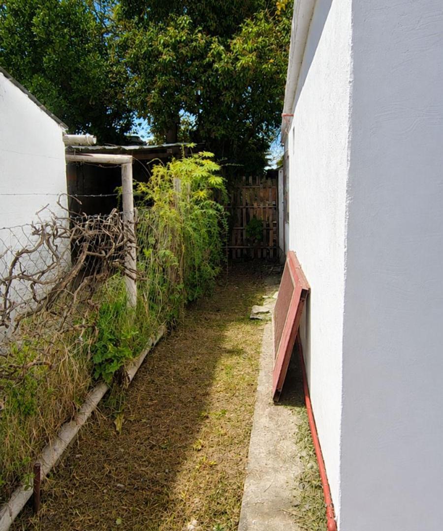Foto de Lote con casa en venta en Benavidez para refacción, imagen 1