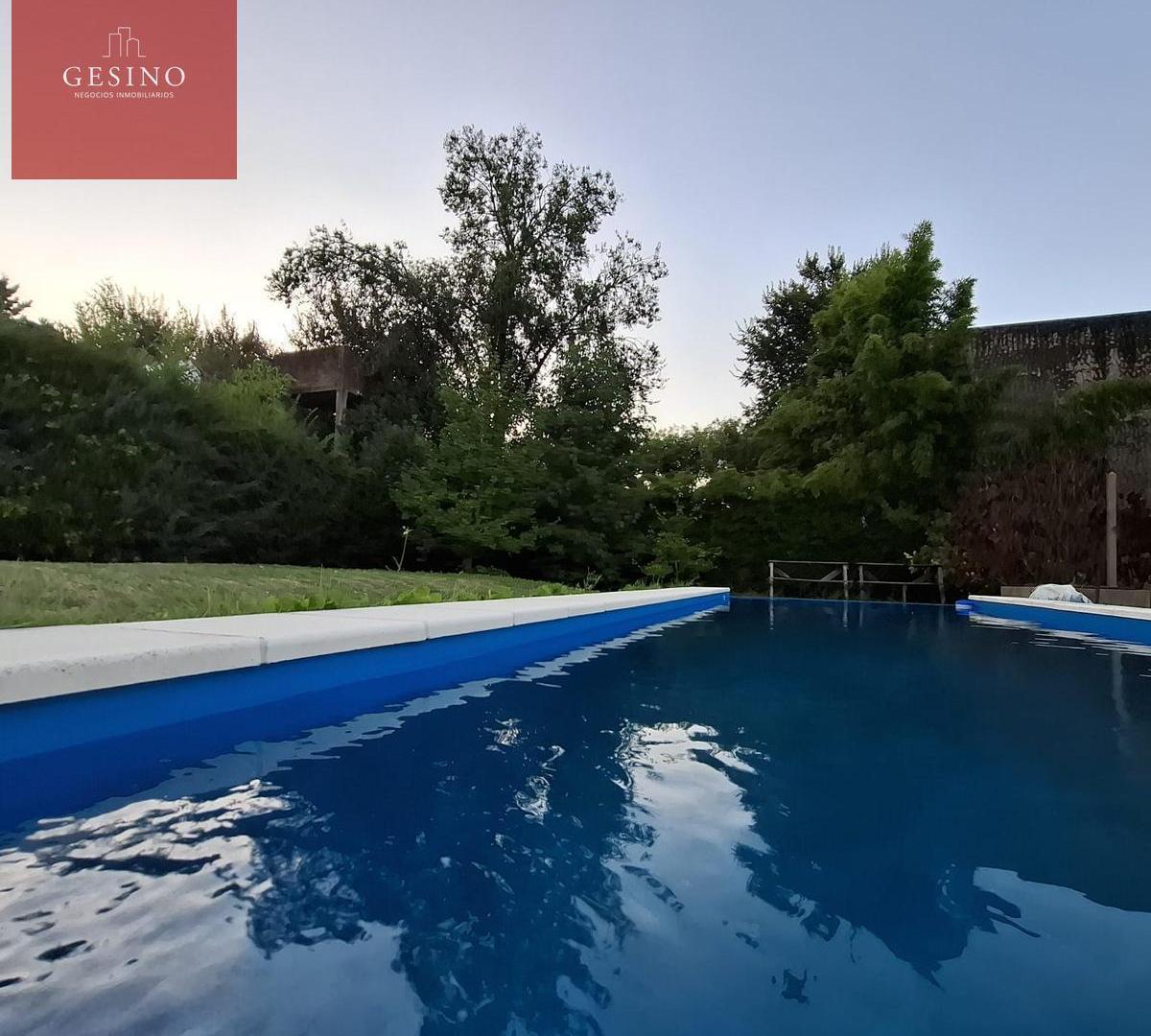 Foto de Terreno con pileta en venta en Villa Elisa, imagen 1