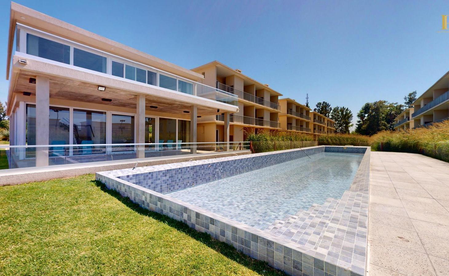 Foto de VENTA Casa Dúplex 5 amb c cochera a estrenar pileta padle SUM GYM, imagen 1