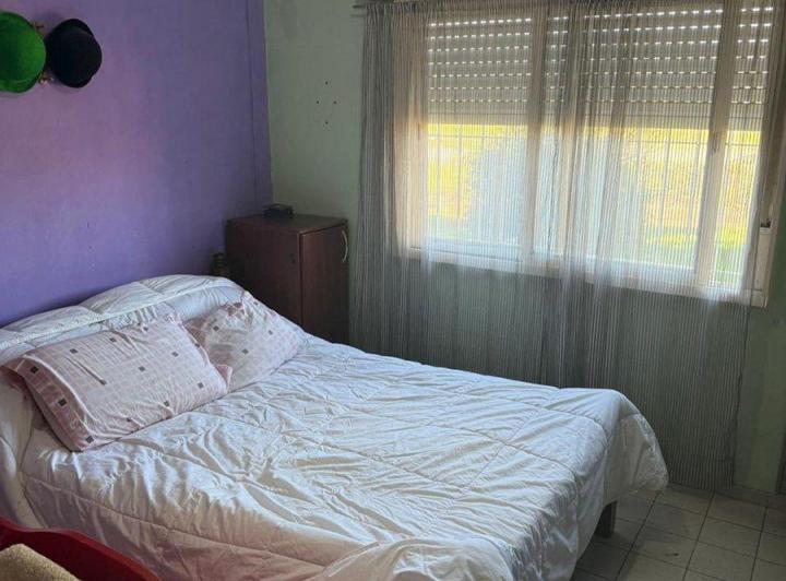 Casa modesta en plena Av San Martin 5