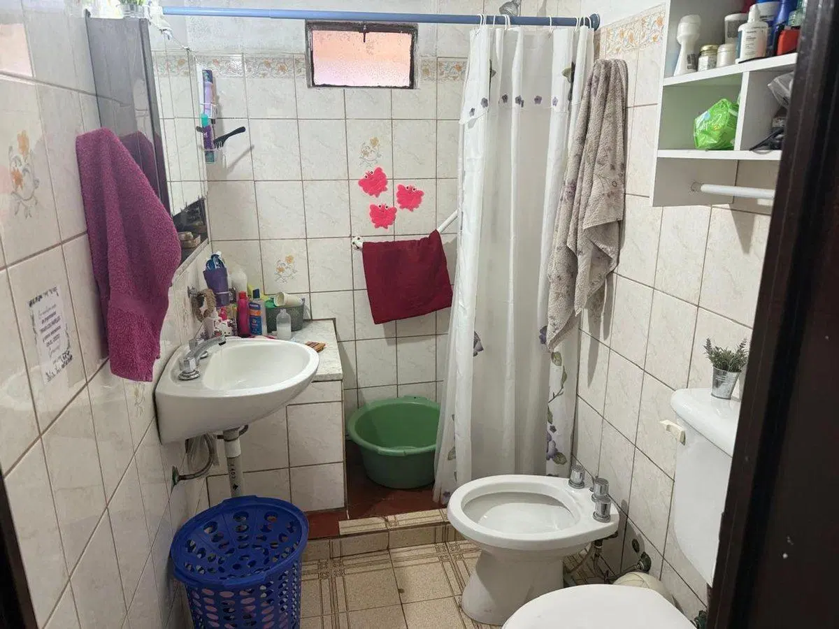 Casa modesta en plena Av San Martin 5