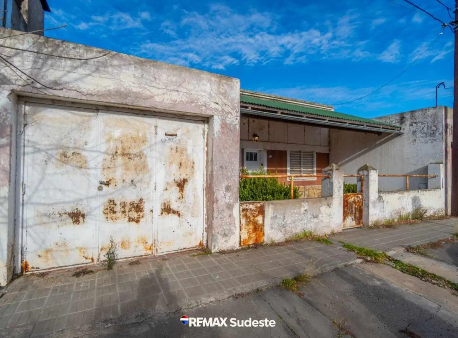 VENTA CASA DOS DORMITORIOS CON GARAGE Y PATIO 3