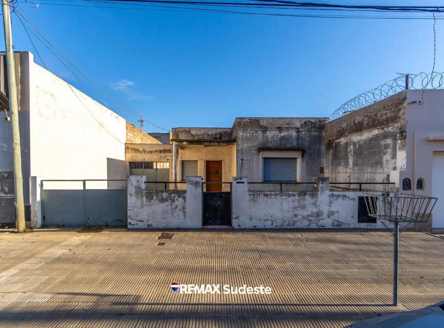 VENTA LOTE CON CASA A REFACCIONAR 8