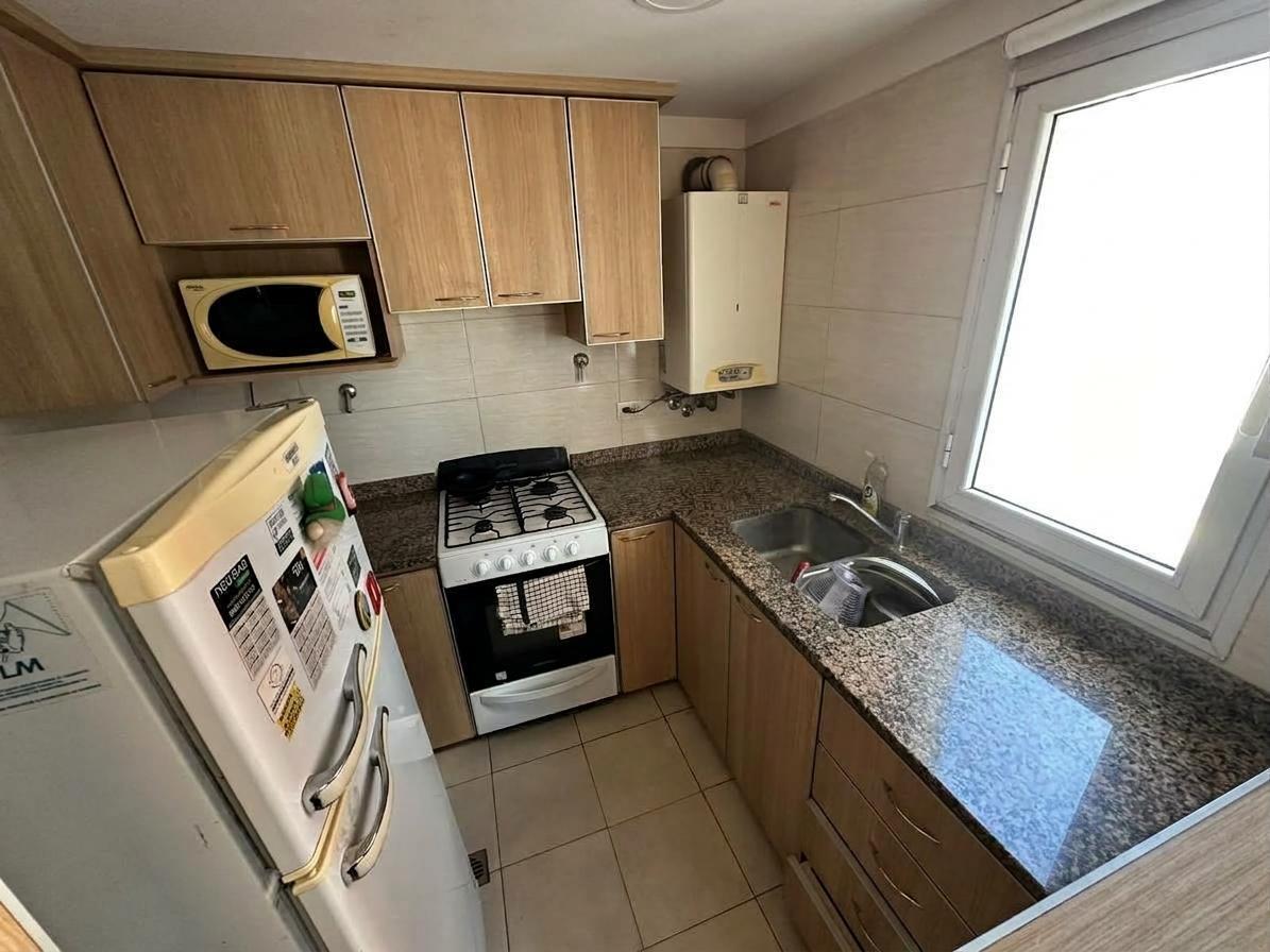 Foto de VENTA DEPARTAMENTO 2 AMBIENTES CON COCHERA LA PERLA, imagen 3