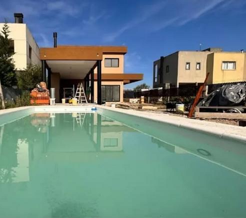 CASA EN VENTA 4 AMB C/ PILETA - A ESTRENAR- BARRIO PRIVADO LAGUNA AZUL