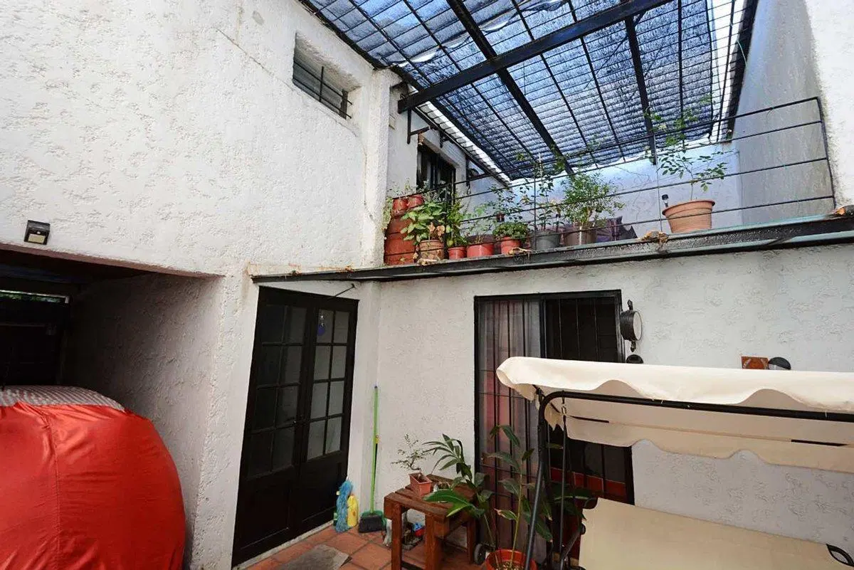 Venta casa con fondo garage y apto en Tres Cruces 3