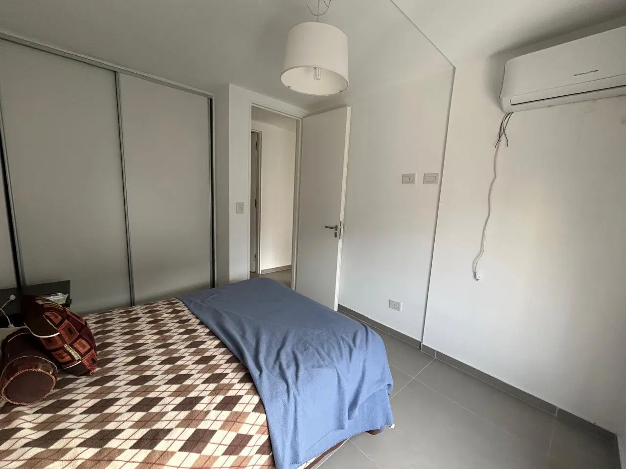 Departamento Categoría | 2 Dormitorios Cochera | Centro de Rosario | 82,80 m² Exclusivos | 9.º Piso 8