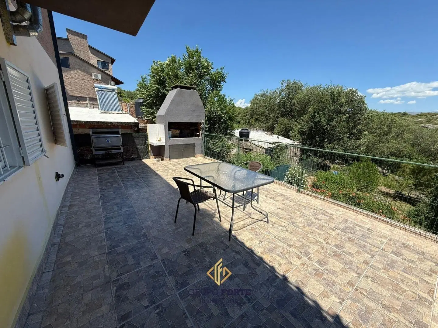CASA EN VENTA CON DEPARTAMENTO EN BARRIO BECCIU, CARLOS PAZ 8