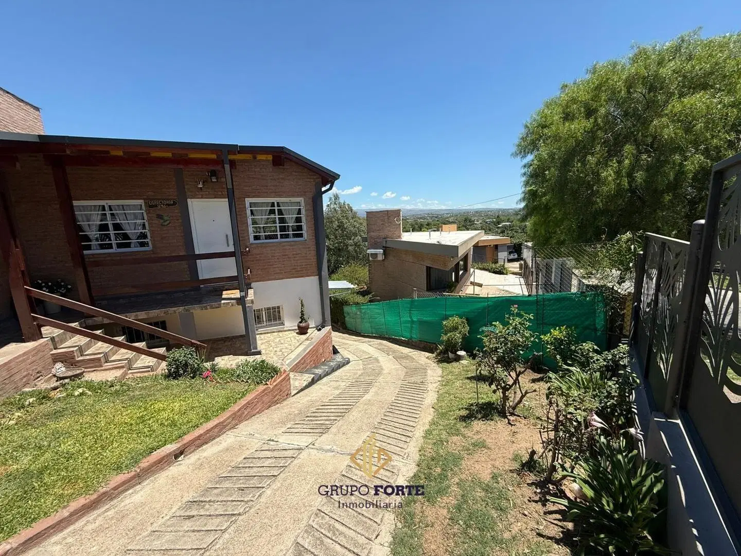 CASA EN VENTA CON DEPARTAMENTO EN BARRIO BECCIU, CARLOS PAZ 2