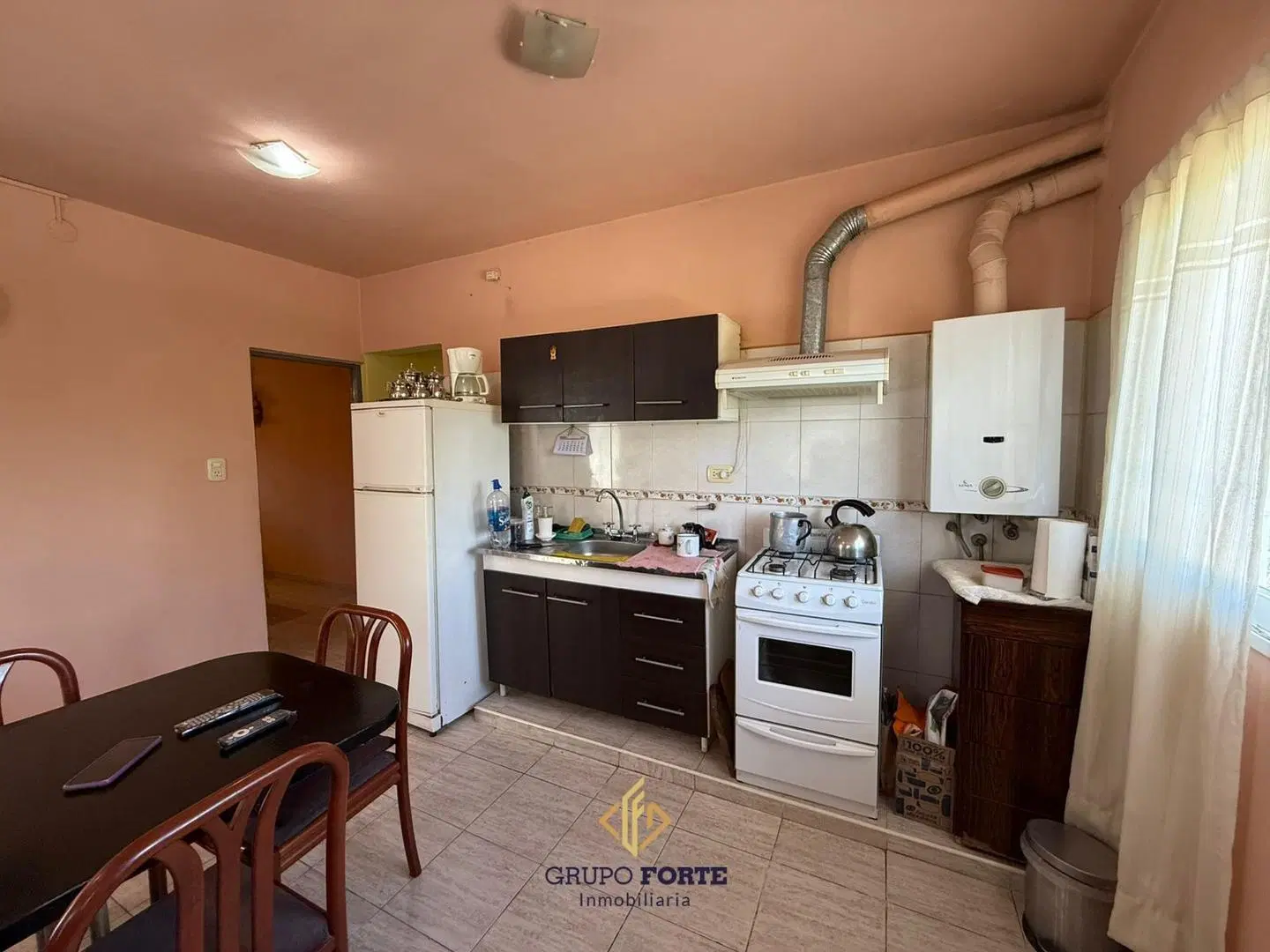 CASA EN VENTA CON DEPARTAMENTO EN BARRIO BECCIU, CARLOS PAZ 5
