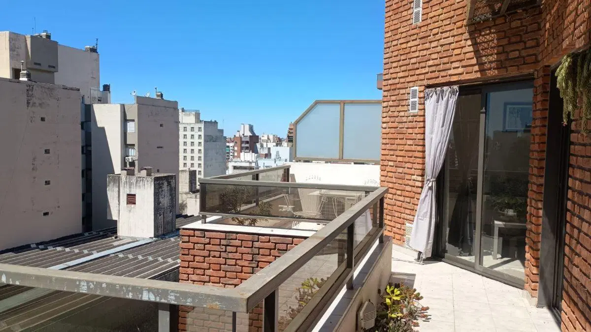 ALQUILO sobre Bv. San Juan DEPARTAMENTO PREMIUN 2dormitorios con terraza y asador 4