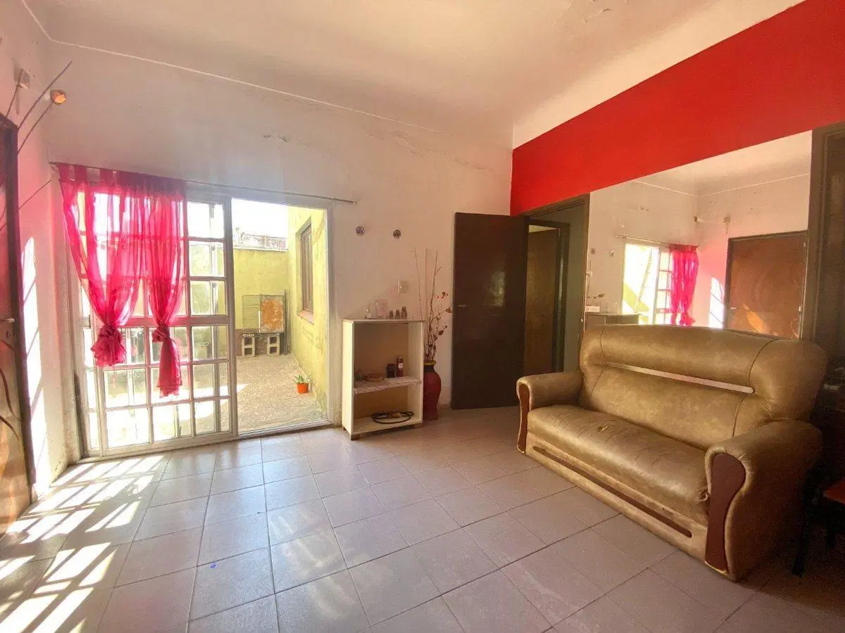 VENTA LOTE CON MEJORAS FRENTE A ESTACIÓN ELPALOMAR 4