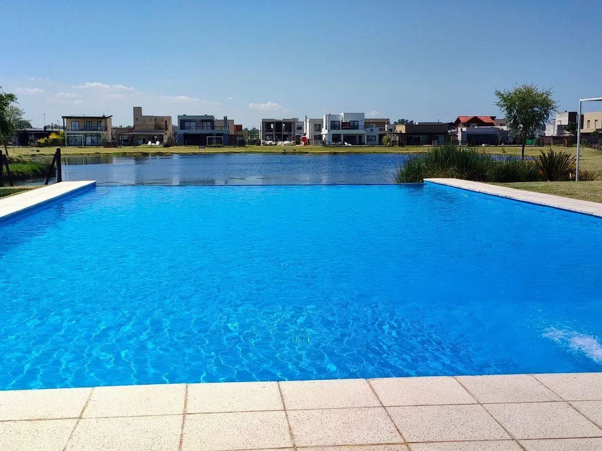 venta lote barrio Laguna Azul id/inv financia Prop 8