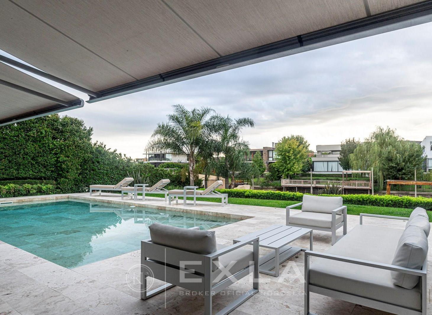 Foto de Casa en alquiler al río en El Yacht – 3 suites, pileta y muelle propio, imagen 1
