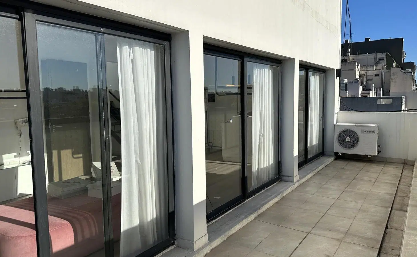 Departamento con Terraza piso alto. 4