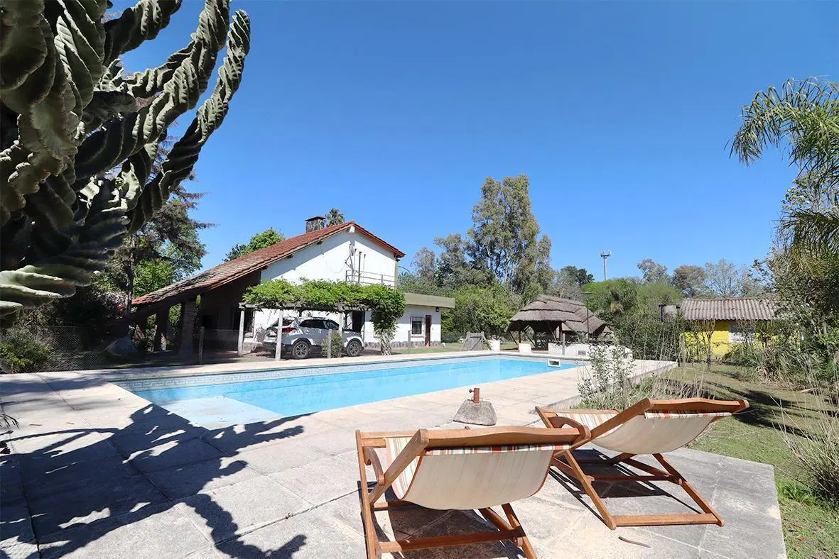 Venta Casa Quinta 4 ambientes con piscina, quincho y jardin en General Rodríguez 3