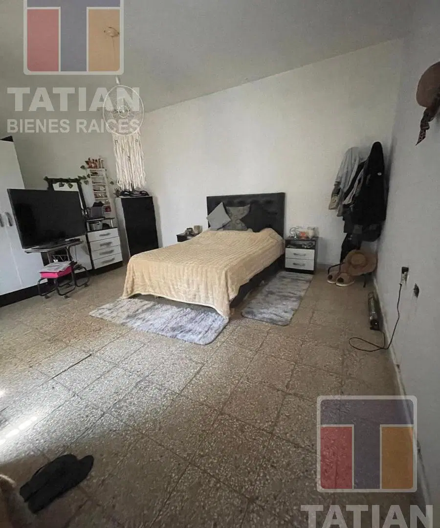 ¡Oportunidad en Barrio Jardín Pilar! Casa Sólida de 2 Dormitorios con Gran Patio y Cochera 4