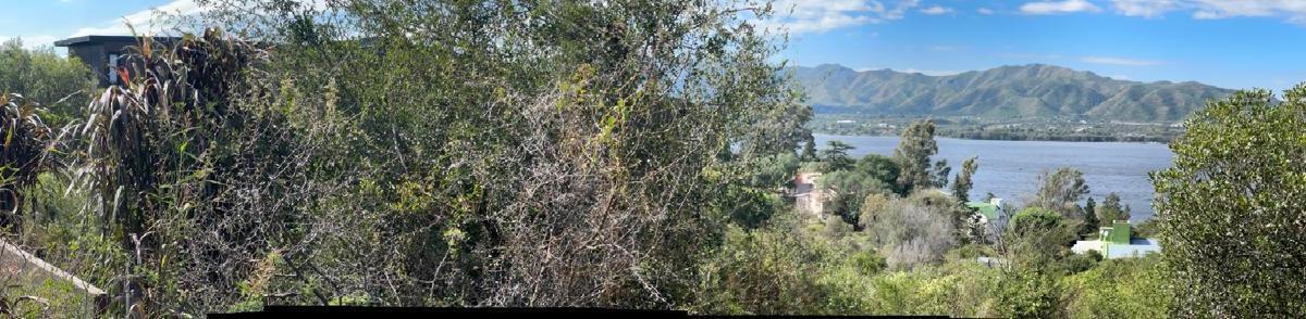 ¡Lote con vista única en Síquiman! Excelente oportunidad de inversión.