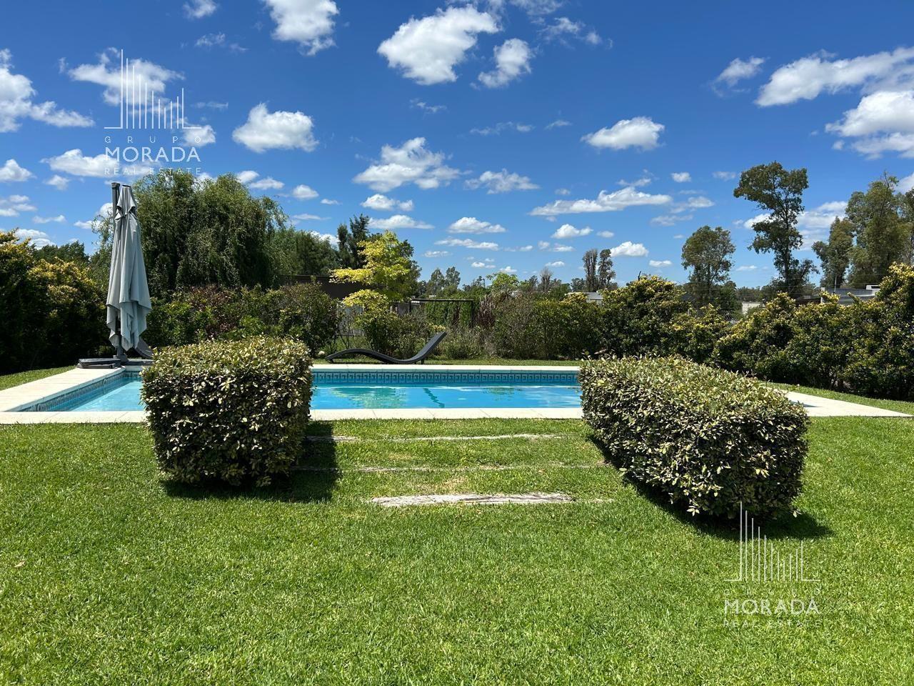 Foto de Casa 5 dormitorios con pileta Santa Guadalupe Pilar del Este, imagen 4