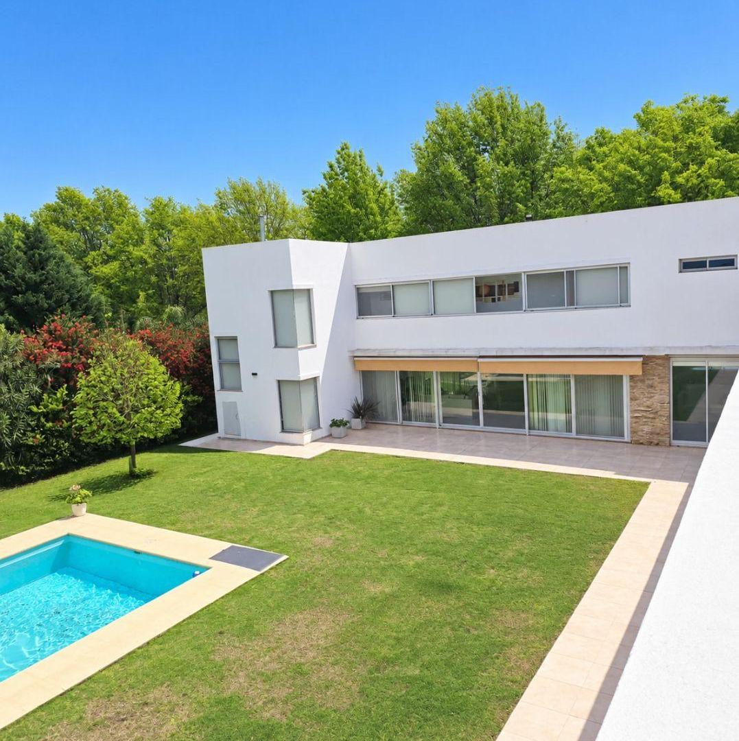 Foto de Casa en venta en Country Los Álamos, Ibarlucea – 5 dormitorios, piscina, imagen 5