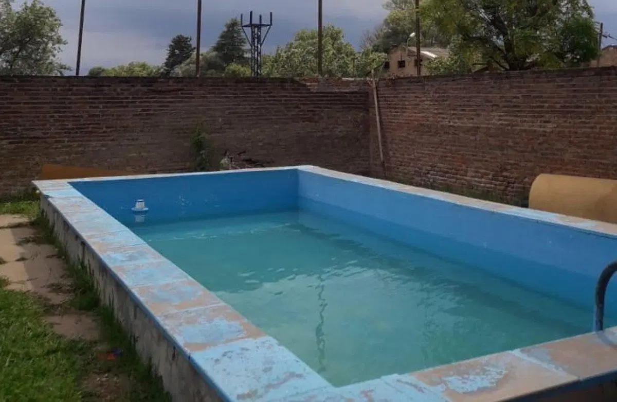 CASA EN VENTA EN PERGAMINO CON PILETA 5