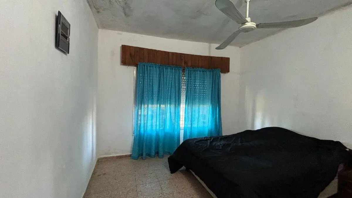 TERRENO EN VENTA EN BRAGADO CON CASA A REFACCIONAR 5