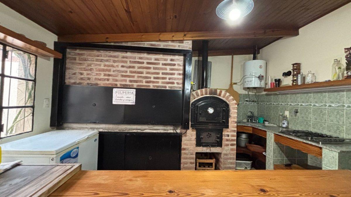 Foto de DEPARTAMENTO EN VENTA EN BRAGADO CON PILETA, imagen 1
