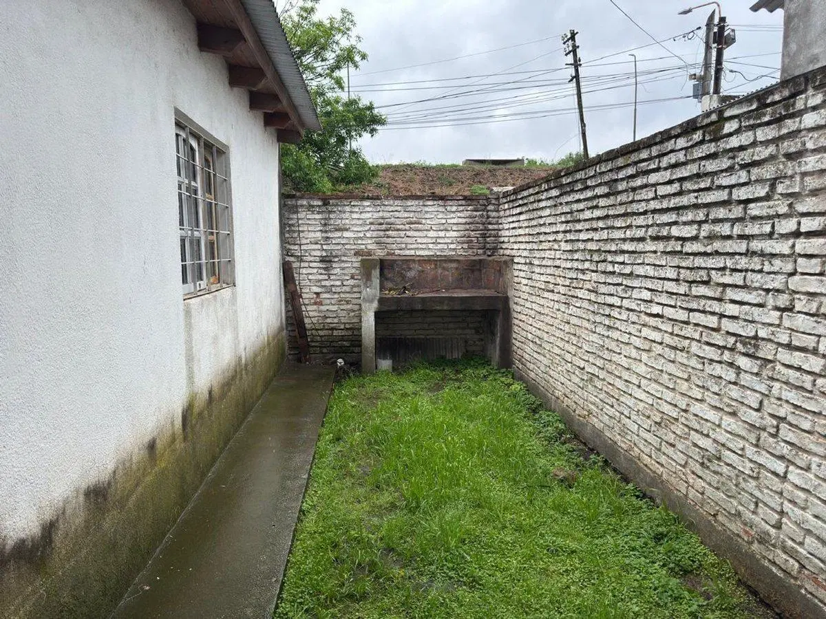 CASA EN VENTA EN PERGAMINO CON PATIO Y COCHERA 5