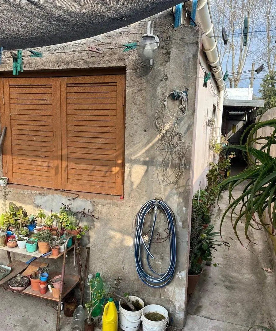 CASA EN VENTA EN 9 DE JULIO CON GALPON 4