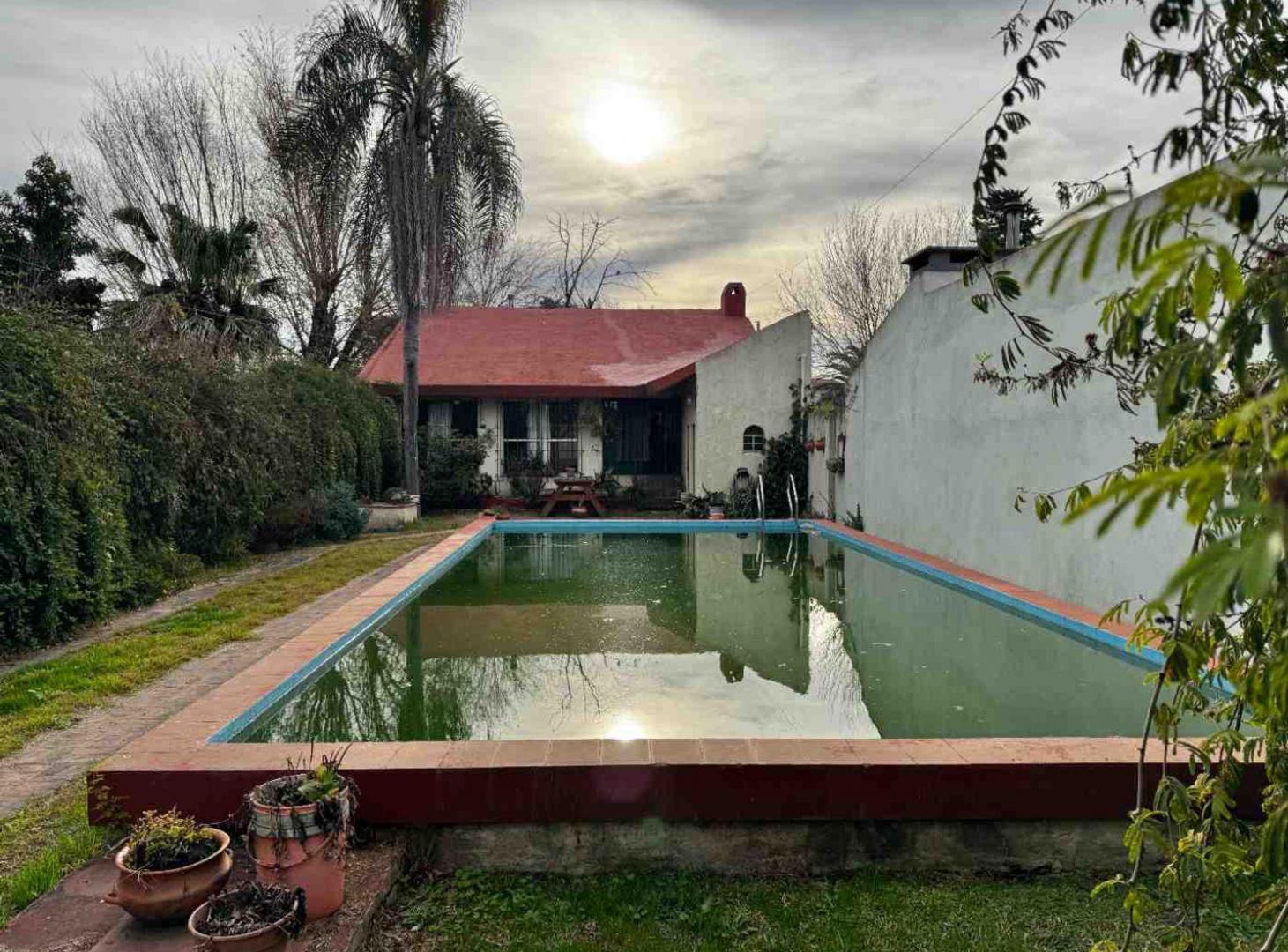 Foto de CASA EN VENTA EN PERGAMINO CON PILETA, imagen 1
