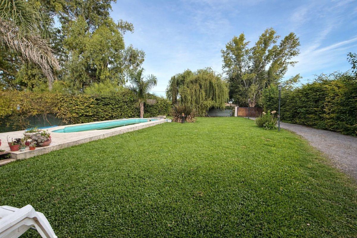 Foto de CASA EN VENTA EN MANUEL OCAMPO CON PILETA, imagen 1