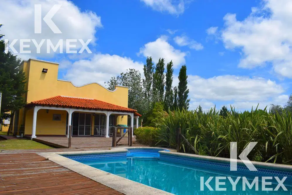 VENTA DE CASA DE 3 DORMITORIOS EN CAMPOS DE ROCA 4