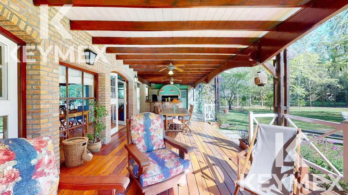 VENTA DE CASA DE 4 DORMITORIOS EN CAMPOS DE ROCA 8