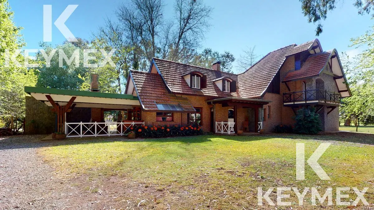 VENTA DE CASA DE 4 DORMITORIOS EN CAMPOS DE ROCA 4