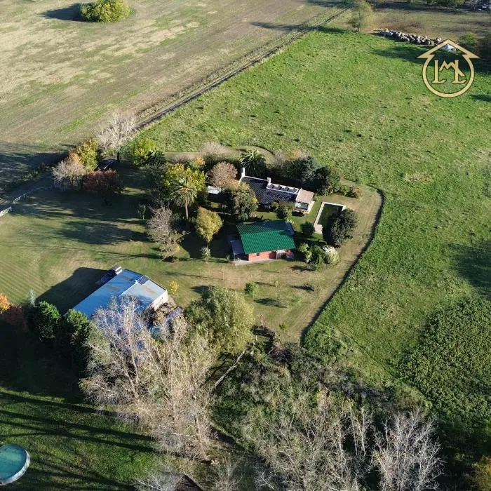 Chacra 2.6 Ha. en San Andrés de Giles: 2 casas con arboleda 1