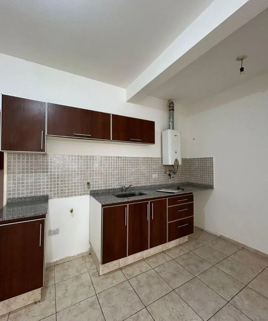 Dpto de un dormitorio con cochera 2