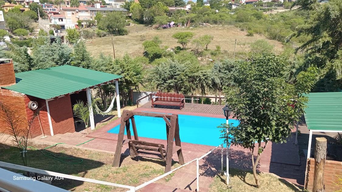 VENTA DE 2 CASAS CON PILETA Y QUINCHO EN CARLOS PAZ