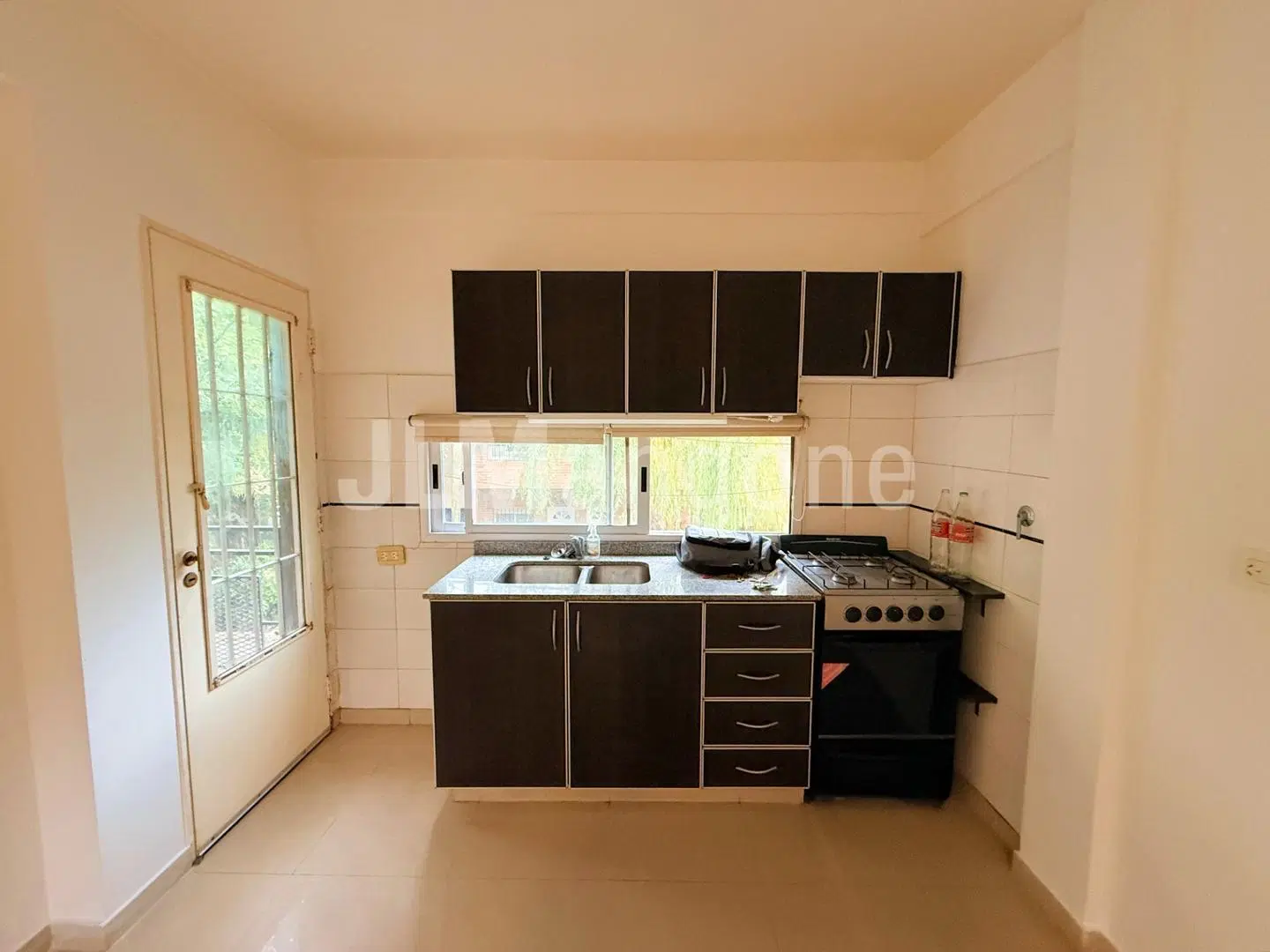 Departamento 2 ambientes con cochera y balcon 2