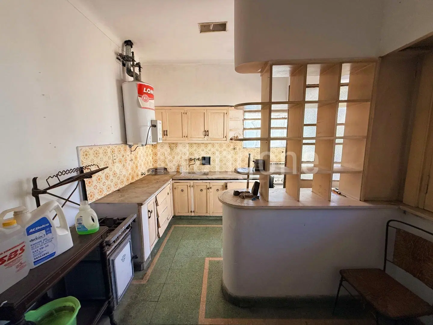 Casa 3 ambientes con cocheras y parque (a refaccionar) 5