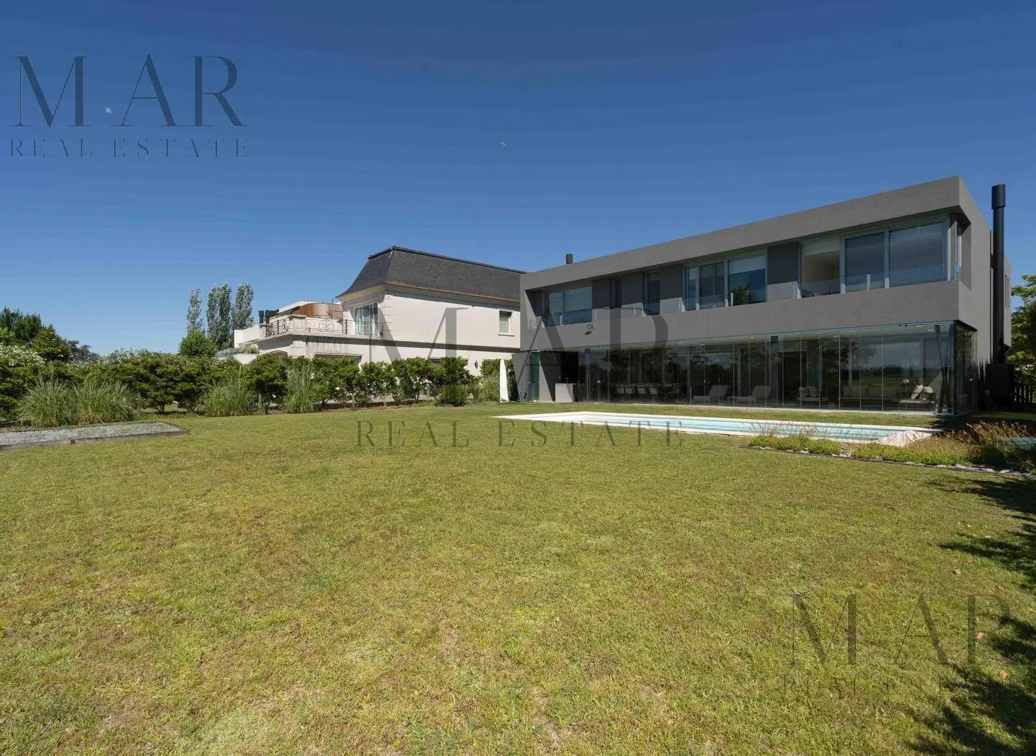 Casa en Venta en El Golf, Nordelta con 5 dormitorios en suite y vista al golf 4