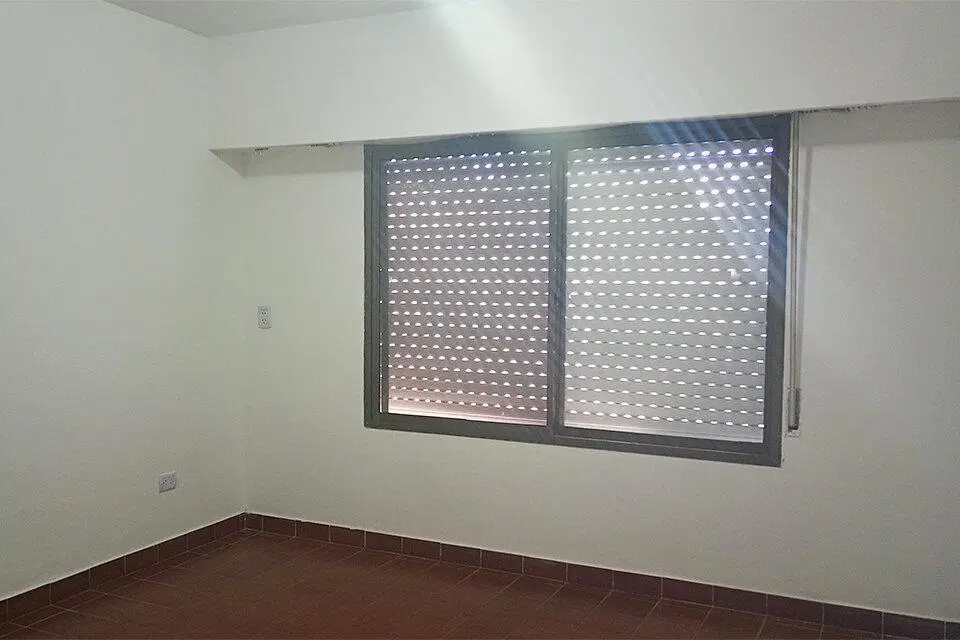 AMPLIA CASA 2 DORMITORIOS CON PATIO Y COCHERA ALVEAR Y COULIN 4