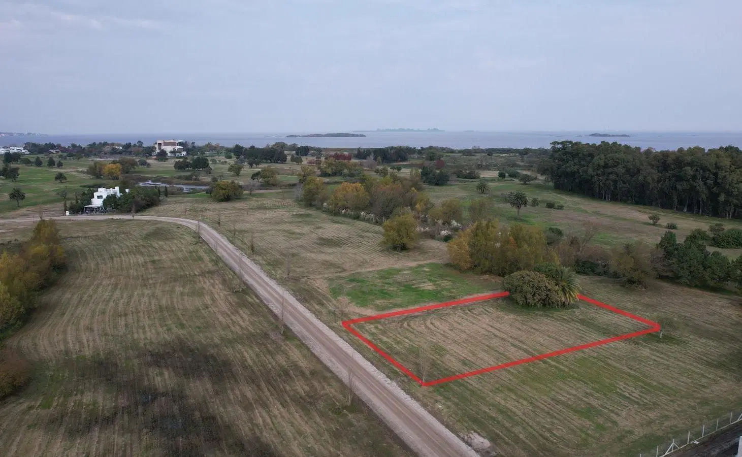 Terreno en Colonia, barrio cerrado, Playa y Golf 1