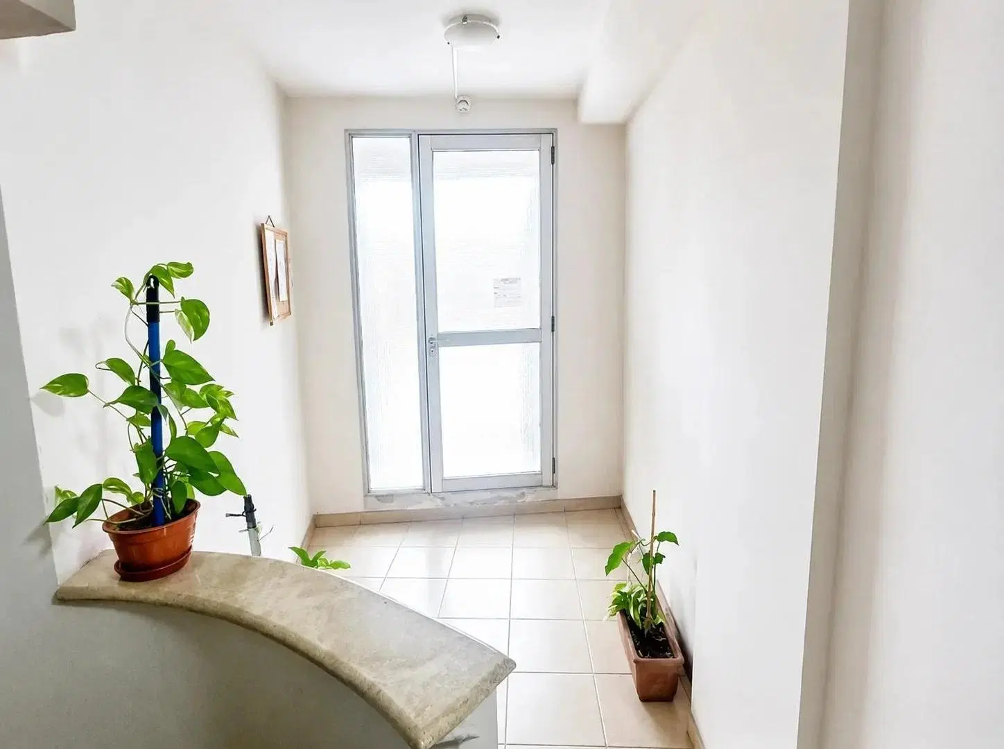 Semipiso de 2 dormitorios con cochera, ventilación cruzada y balcón | Barrio Lourdes | Rosario 8