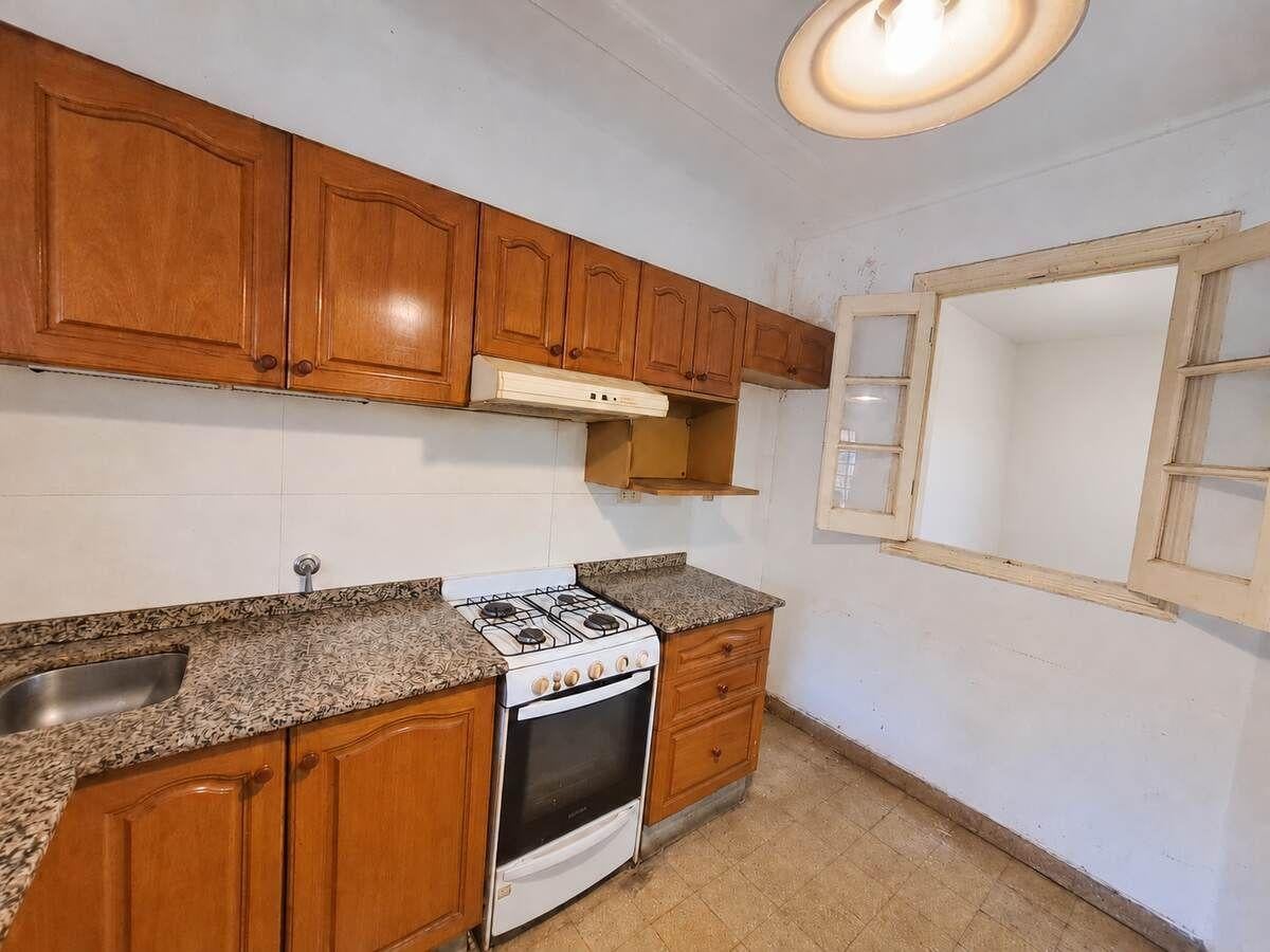 Foto de Casa de 3 dormitorios con garage, jardín y terraza en Echesortu, imagen 1