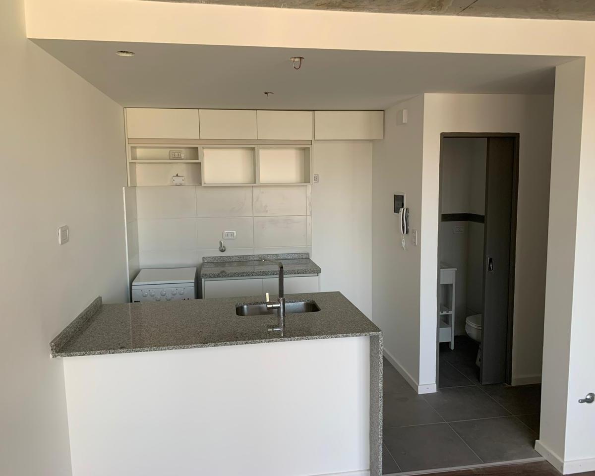 Foto de VENTA DEPARTAMENTO DE UN DORMITORIO CON COCHERA EN ARROYITO, imagen 2