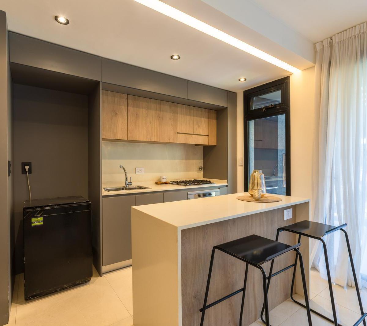 EN VENTA – CASA DOS DORMITORIOS CON PARRILLERO PILETA Y JARDÍN – FISHERTON