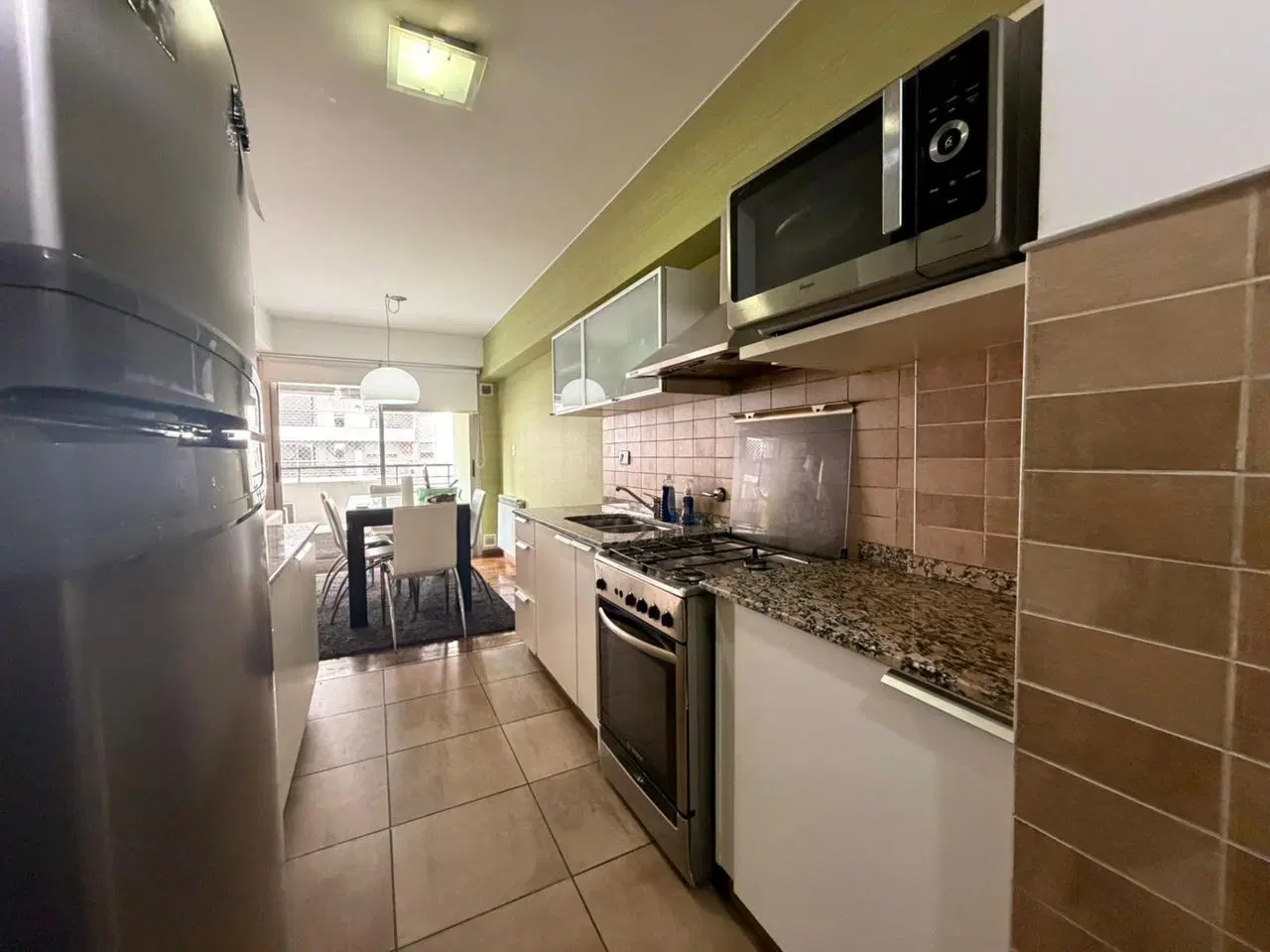 VENTA DEPARTAMENTO 2 DORMITORIOS Y COCHERA DOBLE - ZONA RÍO 5