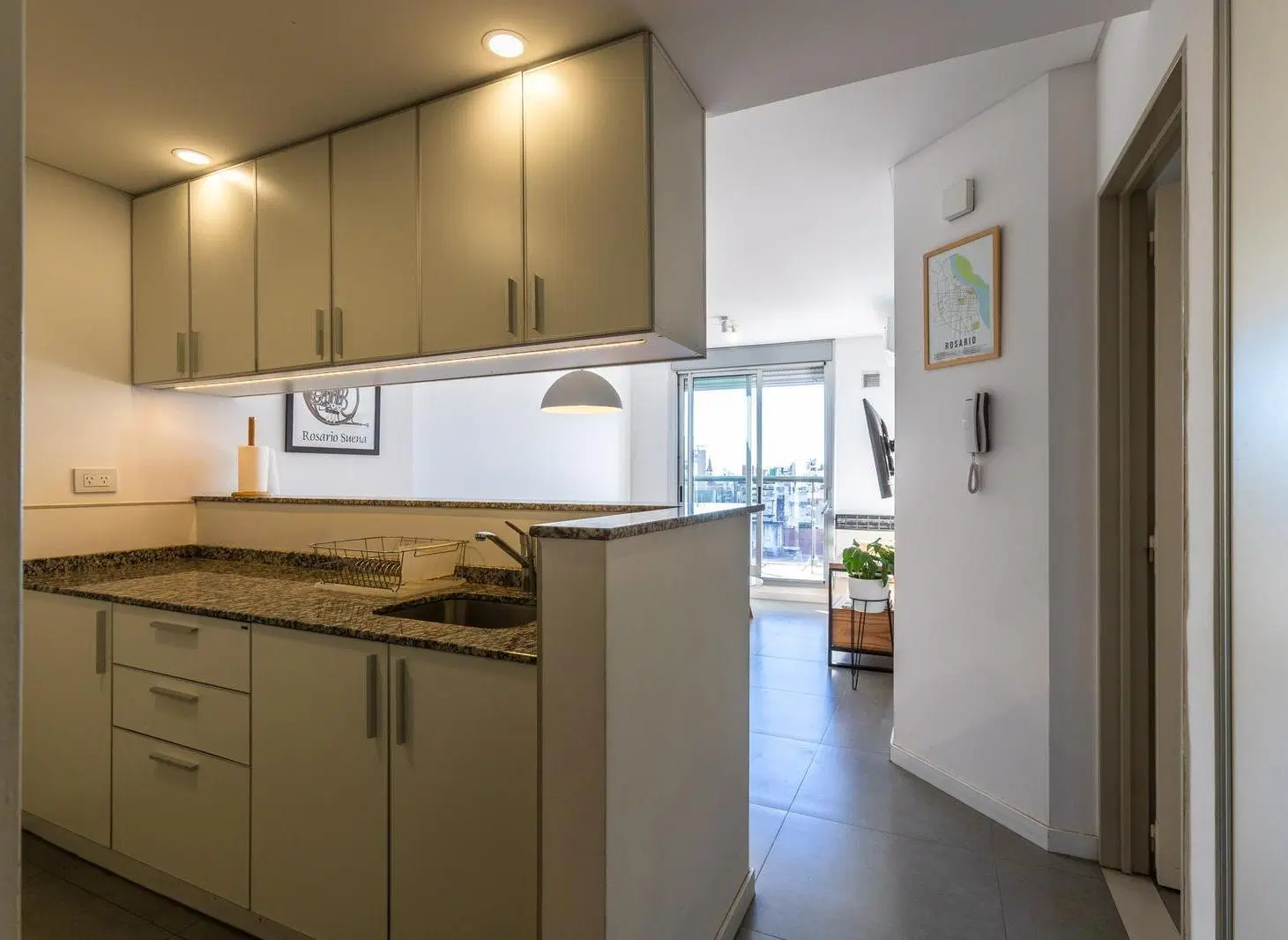 VENTA - DEPARTAMENTO DOS DORMITORIOS CON COCHERA - CENTRO RIO 5