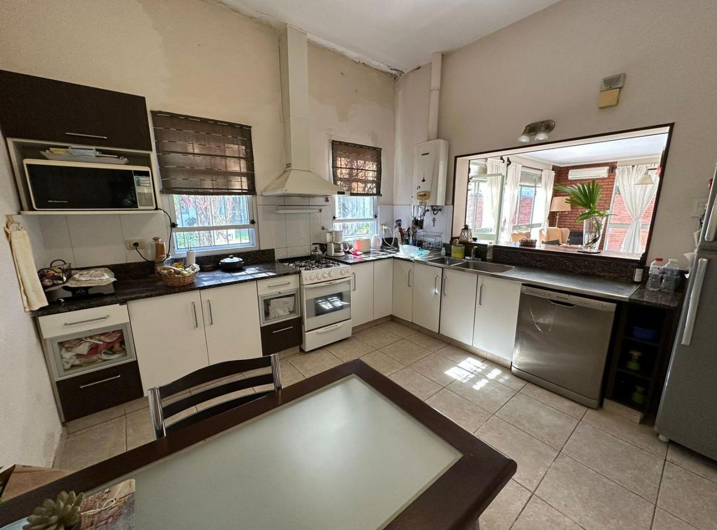 Foto de VENTA CASA TRES DORMITORIOS CON AMPLIO JARDIN Y LOTE ALBERDI RIO, imagen 5